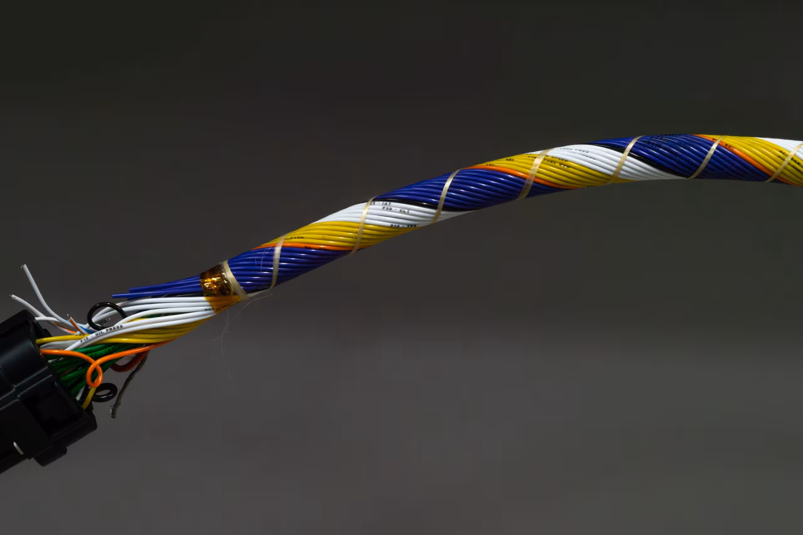 Concentrically twisted tefzel harness with laser wire marking